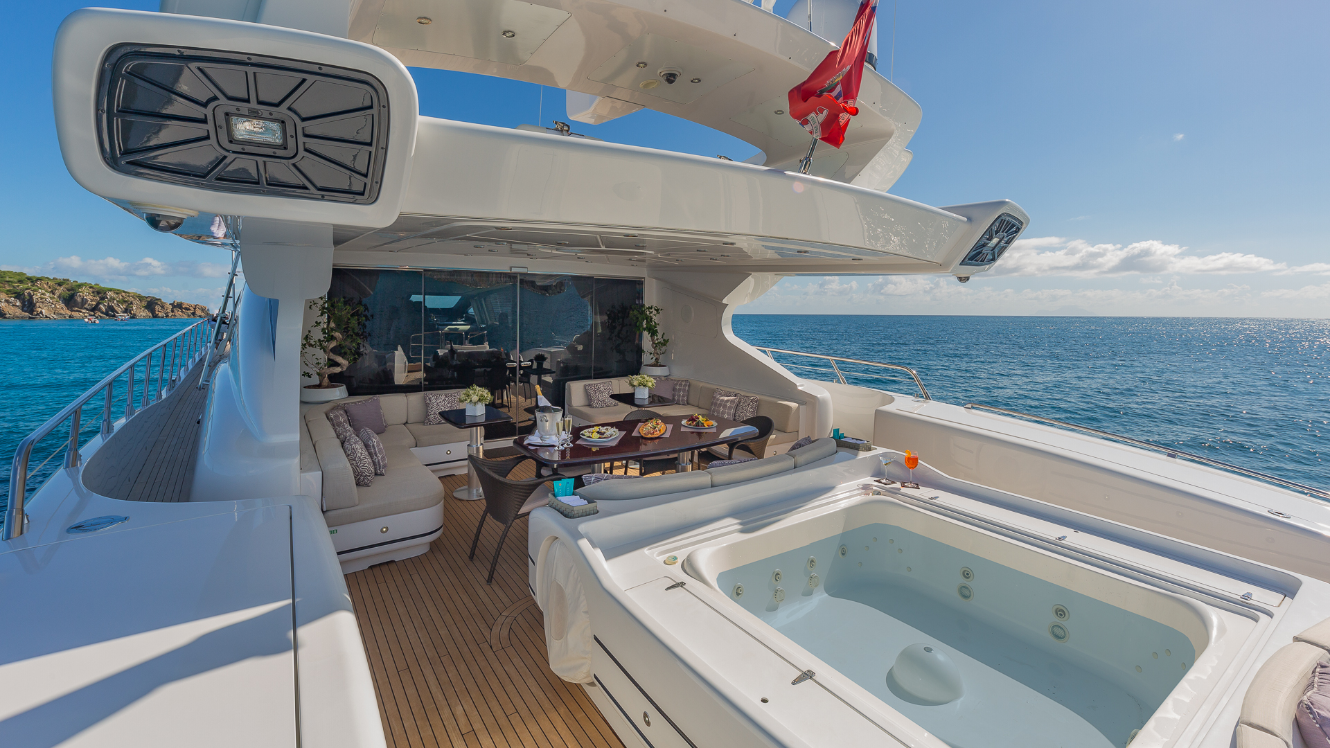 "JOMAR", a 2007 Mangusta 40m motor yacht for charter, aft deck jacuzzi