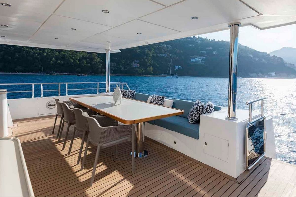 Nomad 95 SUV, a 2027 Nomad Yachts 29.77m motor yacht for sale, aft deck dining
