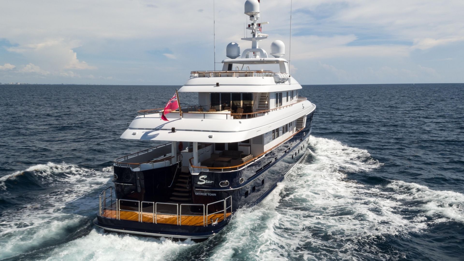 "OCEAN'S SEVEN", a 2012 Kingship 42m motor yacht for charter, stern