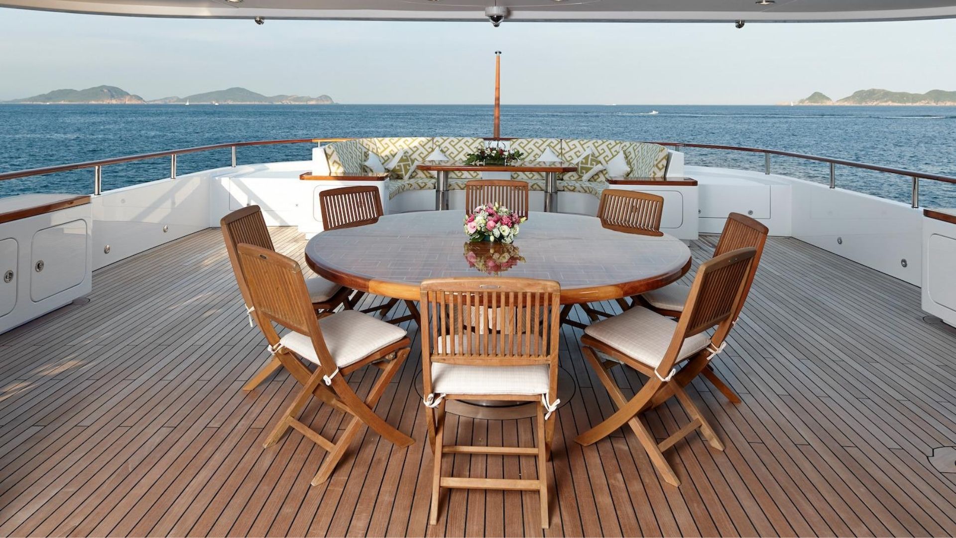 "OCEAN'S SEVEN", a 2012 Kingship 42m motor yacht for charter, aft deck dining